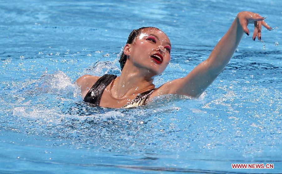 Huang Xuechen of China competes in the Solo Preliminaries of the Synchronised Swimming competition in the 15th FINA World Championships at Palau Sant Jordi in Barcelona, Spain, on July 22, 2013. Huang advanced to the final with a total score of 95.280 points.(Xinhua/Wang Lili) 
