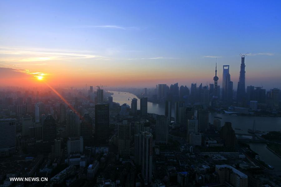 The photo taken on July 23, 2013 shows a scenery of downtown Shanghai, east China, in the early morning. (Xinhua/Zhu Yingying)