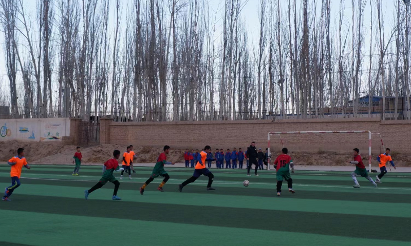 Students at Eksak Elementary School play a football game in Artux City, Northwest China’s Xinjiang Uygur Autonomous Region. Photo: Xu Keyue/GT